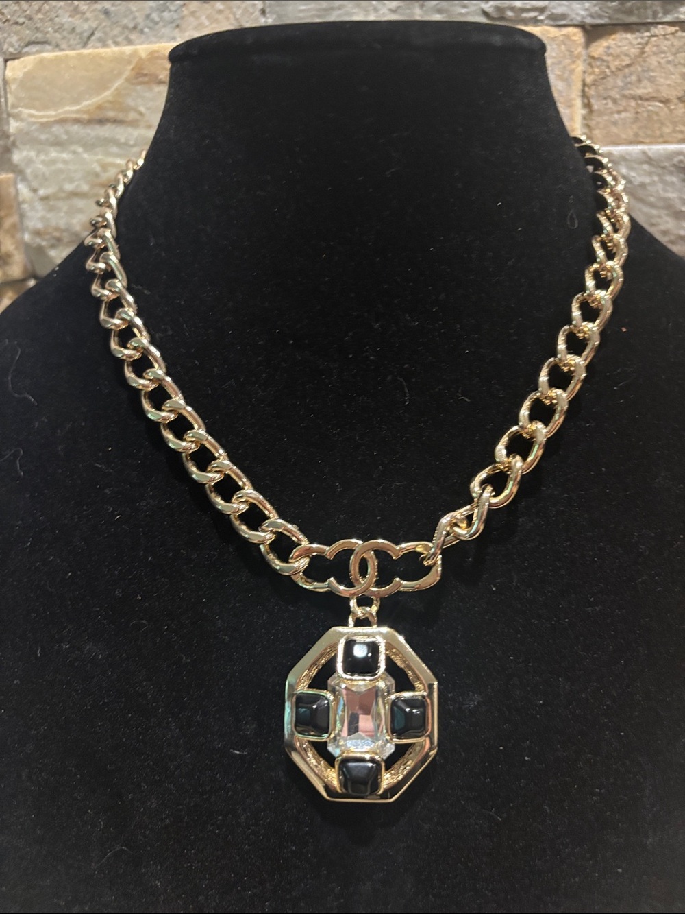 Gold Tone Chain Necklace with A CC Black and Clear Gem Pendant